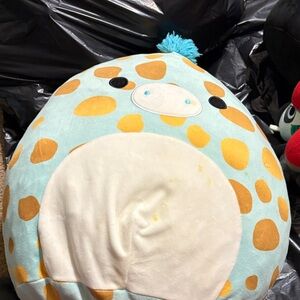 Plush Dinosaur Toy with Blue and Orange Spots